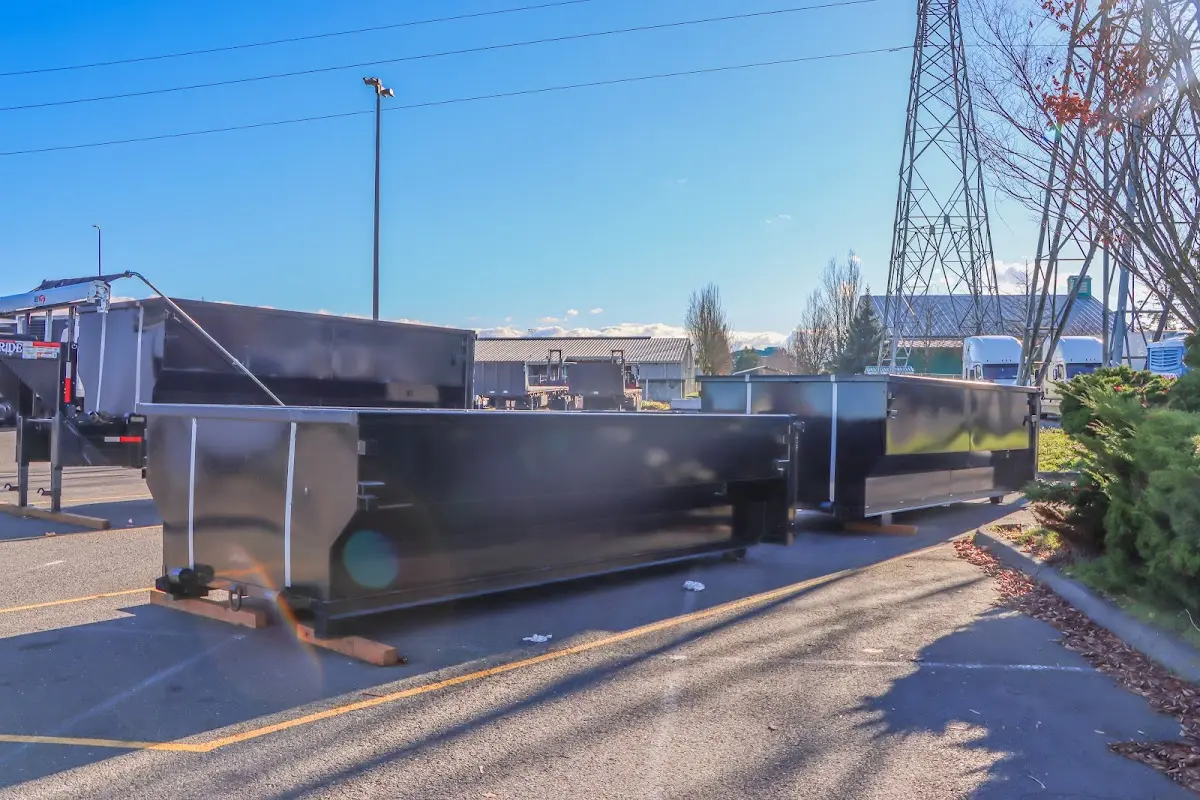 Roll-off dumpster ready for waste disposal at job site for 2 Yard Dumpster Rental in Micco